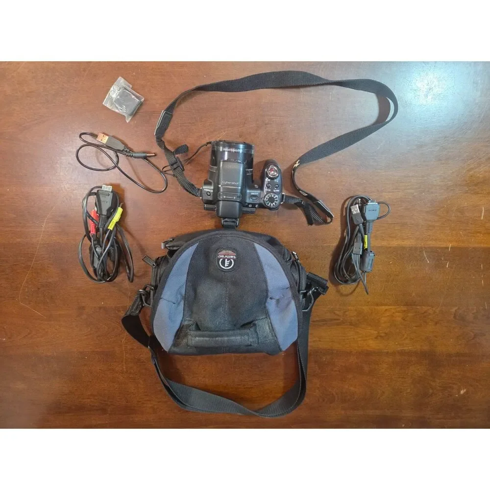 Sony Cyber-shot DSC-HX100V Camera Bundle w/ Tamrac Bag, Cables & Battery